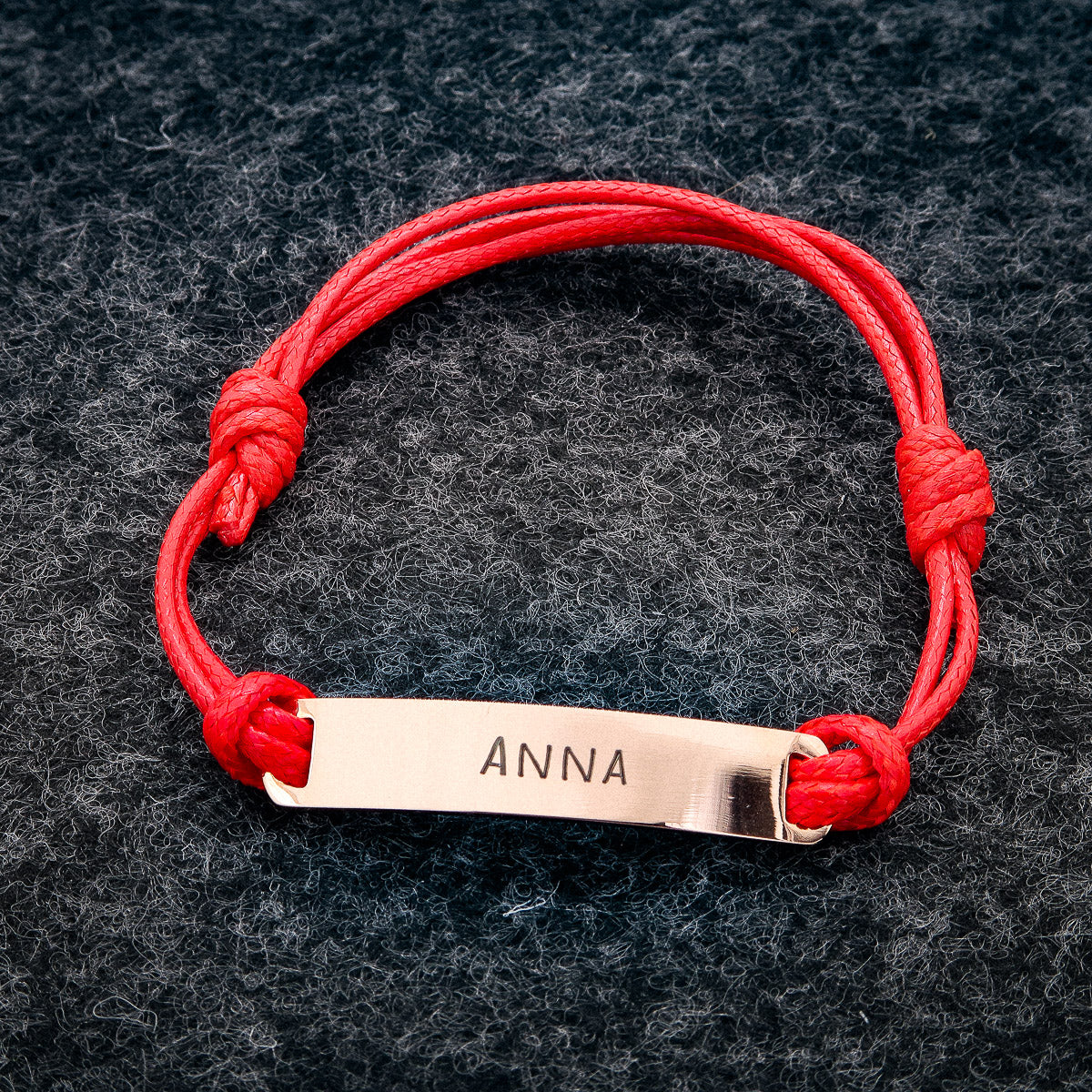 Leuke touw "Statement" armband met naamplaatje