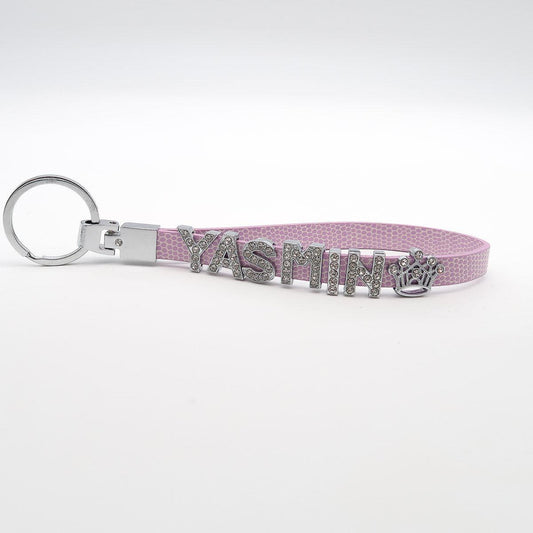 Gepersonaliseerde sleutelhanger "Bling Bling" met één letter voor de naam. Glamour voor de sleutel